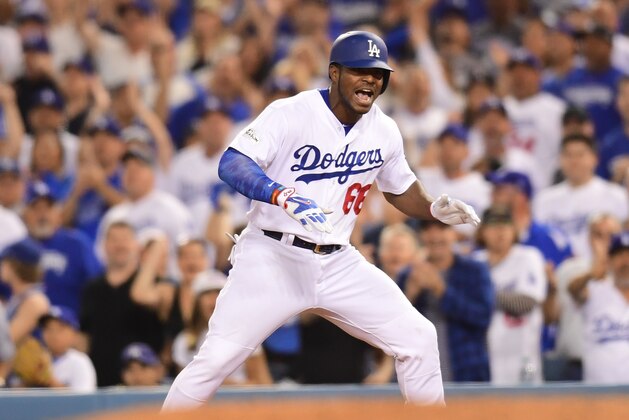 LOS ANGELES, CA - OCTOBER 07:  Yasiel Puig #66 of the Los Angeles Dodgers reacts to his fourth inning single against the Arizona Diamondbacks in game two of the National League Division Series at Dodger Stadium on October 7, 2017 in Los Angeles, California.  (Photo by Harry How/Getty Images)