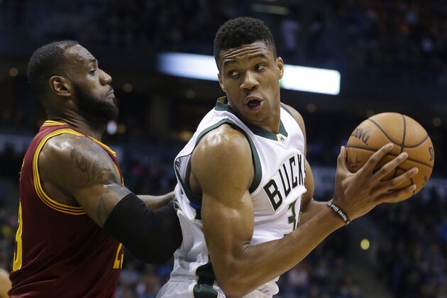 Milwaukee Bucks' Giannis Antetokounmpo is defended by Cleveland Cavaliers' LeBron James during an NBA basketball game Tuesday, Nov. 29, 2016, in Milwaukee. (AP Photo/Aaron Gash)