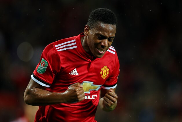 MANCHESTER, ENGLAND - SEPTEMBER 20:  Anthony Martial of Manchester United celebrates scoring his sides fourth goal during the Carabao Cup Third Round match between Manchester United and Burton Albion at Old Trafford on September 20, 2017 in Manchester, England.  (Photo by Richard Heathcote/Getty Images)