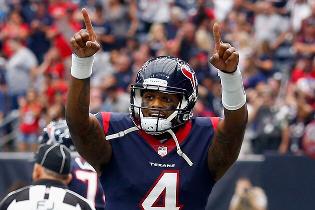 HOUSTON, TX - OCTOBER 01:  Deshaun Watson #4 of the Houston Texans celebrates his touchdown run  against the Tennessee Titans at NRG Stadium on October 1, 2017 in Houston, Texas. Houston won 57-14.  (Photo by Bob Levey/Getty Images)