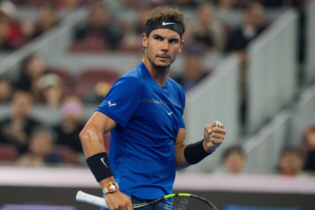 Rafael Nadal of Spain celebrates winning a point during his men's singles final match against Nick Kyrgios of Australia at the China Open tennis tournament in Beijing on October 8, 2017. / AFP PHOTO / NICOLAS ASFOURI        (Photo credit should read NICOLAS ASFOURI/AFP/Getty Images)