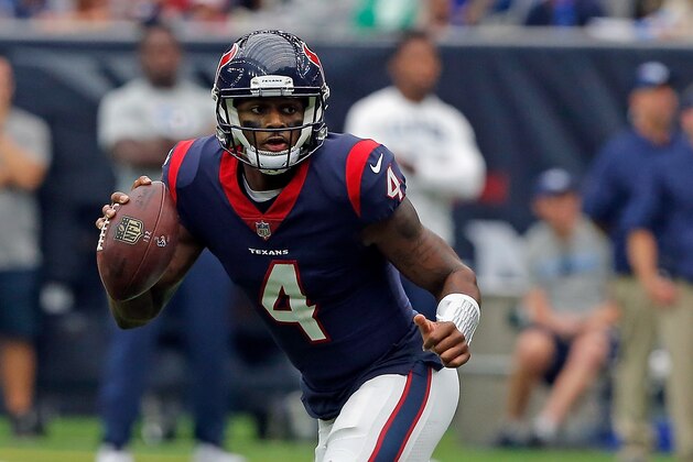 HOUSTON, TX - OCTOBER 01: Deshaun Watson #4 of the Houston Texans rushes out of the pocket against the Tennessee Titans at NRG Stadium on October 1, 2017 in Houston, Texas. Houston won 57-14.  (Photo by Bob Levey/Getty Images)