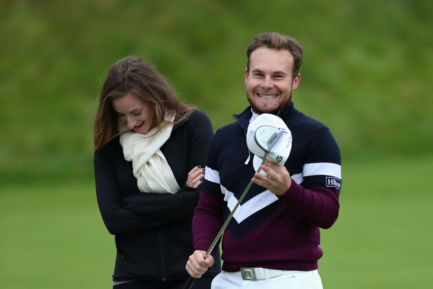 ST ANDREWS, SCOTLAND - OCTOBER 08: Tyrrell Hatton of England celebrates victory with his girlfriend, Emily Breisher following the final round of the 2017 Alfred Dunhill Championship at The Old Course on October 8, 2017 in St Andrews, Scotland. (Photo by Richard Heathcote/Getty Images) ST ANDREWS, SCOTLAND - OCTOBER 08: Tyrrell Hatton of England celebrates victory with his girlfriend, Emily Breisher following the final round of the 2017 Alfred Dunhill Championship at The Old Course on October 8, 2017 in St Andrews, Scotland. (Photo by Richard Heathcote/Getty Images)