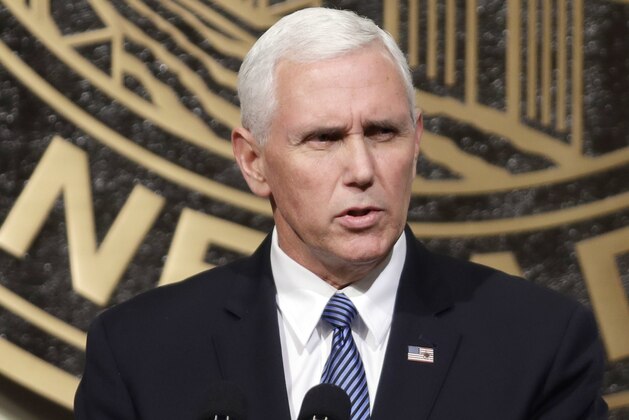 Vice President Mike Pence speaks in Las Vegas on Saturday, Oct. 7, 2017, following a unity prayer walk honoring the victims of last weekend's massacre. (AP Photo/Isaac Brekken)