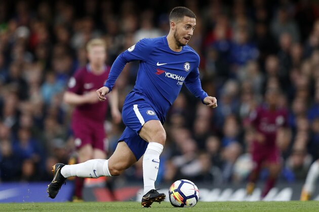 Chelsea's Belgian midfielder Eden Hazard runs with the ball during the English Premier League football match between Chelsea and Manchester City at Stamford Bridge in London on September 30, 2017. / AFP PHOTO / Adrian DENNIS / RESTRICTED TO EDITORIAL USE. No use with unauthorized audio, video, data, fixture lists, club/league logos or 'live' services. Online in-match use limited to 75 images, no video emulation. No use in betting, games or single club/league/player publications.  /         (Photo credit should read ADRIAN DENNIS/AFP/Getty Images)
