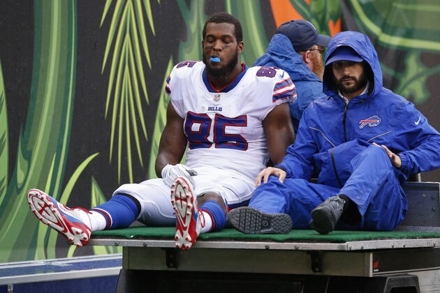 Buffalo Bills tight end Charles Clay (85) is carted off the field in the first half of an NFL football game against the Cincinnati Bengals, Sunday, Oct. 8, 2017, in Cincinnati. (AP Photo/Gary Landers)