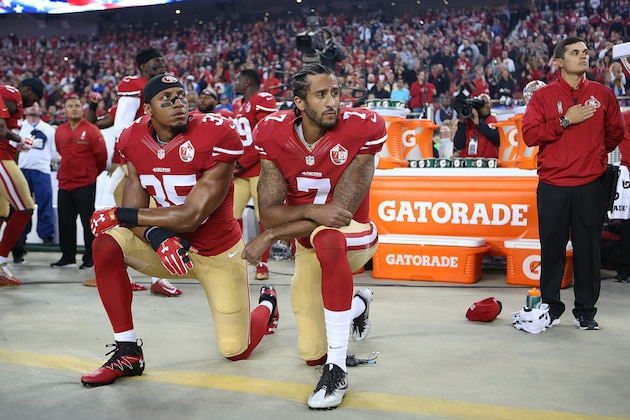San Francisco 49ers Eric Reid (35) and Colin Kaepernick (7) take a knee during the National Anthem prior to their season opener against the Los Angeles Rams during an NFL football game Monday, Sept. 12, 2016, in Santa Clara, CA. The Niners won 28-0. (Daniel Gluskoter/AP Images for Panini) San Francisco 49ers Eric Reid (35) and Colin Kaepernick (7) take a knee during the National Anthem prior to their season opener against the Los Angeles Rams during an NFL football game Monday, Sept. 12, 2016, in Santa Clara, CA. The Niners won 28-0. (Daniel Gluskoter/AP Images for Panini)