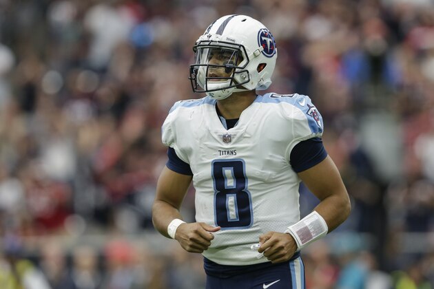 HOUSTON, TX - OCTOBER 01:  Marcus Mariota #8 of the Tennessee Titans jogs off the field after an interception in the first half against the Houston Texans at NRG Stadium on October 1, 2017 in Houston, Texas.  (Photo by Tim Warner/Getty Images)