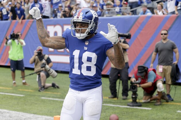 New York Giants wide receiver Roger Lewis celebrates his touchdown catch against the Los Angeles Chargers during the second half of an NFL football game, Sunday, Oct. 8, 2017, in East Rutherford, N.J. (AP Photo/Seth Wenig)