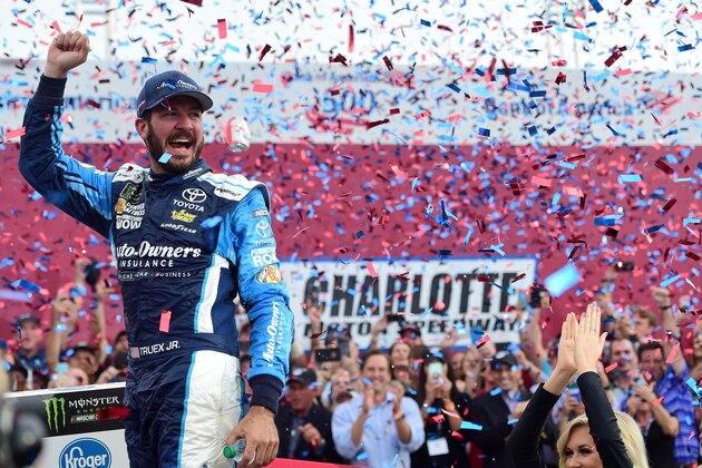 CHARLOTTE, NC - OCTOBER 08:  Martin Truex Jr, driver of the #78 Auto-Owners Insurance Toyota, celebrates in victory lane after winning  the Monster Energy NASCAR Cup Series Bank of America 500 at Charlotte Motor Speedway on October 8, 2017 in Charlotte, North Carolina.  (Photo by Jared C. Tilton/Getty Images)