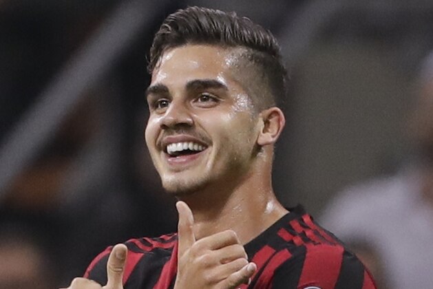 AC Milan's Andre Silva celebrates after scoring during the Europa League group D soccer match between AC Milan and Rijeka, at the Milan San Siro Stadium, Italy, Thursday, Sept. 28, 2017. (AP Photo/Luca Bruno)