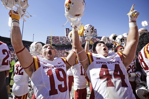 NORMAN, OK - OCTOBER 07: Wide receiver Trever Ryen #19 and linebacker Bobby McMillen III #44 of the Iowa State Cyclones celebrate after the game against the Oklahoma Sooners at Gaylord Family Oklahoma Memorial Stadium on October 7, 2017 in Norman, Oklahoma. Iowa State defeated Oklahoma 38-31. (Photo by Brett Deering/Getty Images)