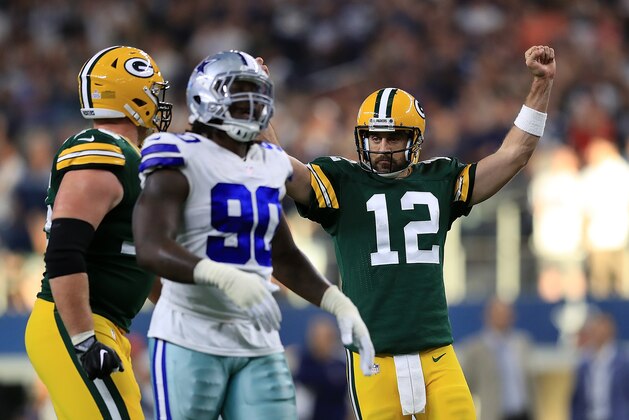 ARLINGTON, TX - OCTOBER 08:  Aaron Rodgers #12 of the Green Bay Packers reacts after throwing the game winning touchdown against the Dallas Cowboys in the fourth quarter at AT&T Stadium on October 8, 2017 in Arlington, Texas.  (Photo by Ronald Martinez/Getty Images)