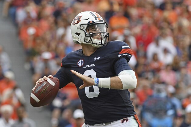 Auburn quarterback Jarrett Stidham (8) prepares to pass during the second half of an NCAA college football game against Mississippi in Auburn, Ala., Saturday, Oct. 7, 2017. Auburn won 44-23. (AP Photo/Thomas Graning)