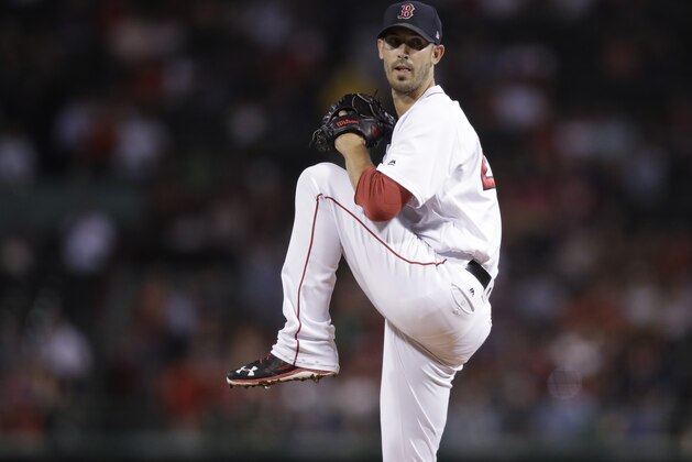 Boston Red Sox starting pitcher Rick Porcello delivers during the first inning of a baseball game at Fenway Park in Boston, Wednesday, Sept. 27, 2017. (AP Photo/Charles Krupa)