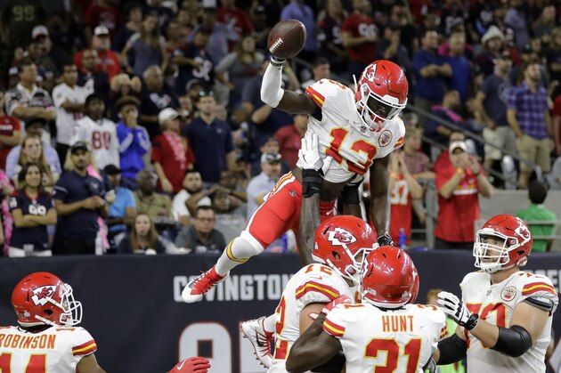 Kansas City Chiefs wide receiver De'Anthony Thomas (13) celebrates his touchdown with teammates during the second half of an NFL football game against the Houston Texans, Sunday, Oct. 8, 2017, in Houston. (AP Photo/David J. Phillip)
