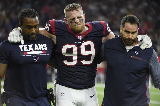 Houston Texans defensive end J.J. Watt (99) is helped off the field after an injury during the first half of an NFL football game Sunday, Oct. 8, 2017, in Houston. (AP Photo/Eric Christian Smith)