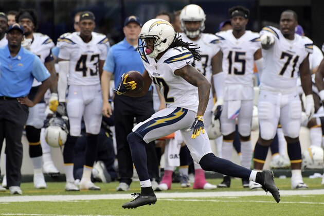 Los Angeles Chargers wide receiver Travis Benjamin (12) runs with the ball against the New York Giants during the second half of an NFL football game, Sunday, Oct. 8, 2017, in East Rutherford, N.J. (AP Photo/Bill Kostroun)