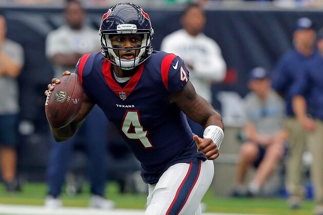 HOUSTON, TX - OCTOBER 01: Deshaun Watson #4 of the Houston Texans rushes out of the pocket against the Tennessee Titans at NRG Stadium on October 1, 2017 in Houston, Texas. Houston won 57-14.  (Photo by Bob Levey/Getty Images)