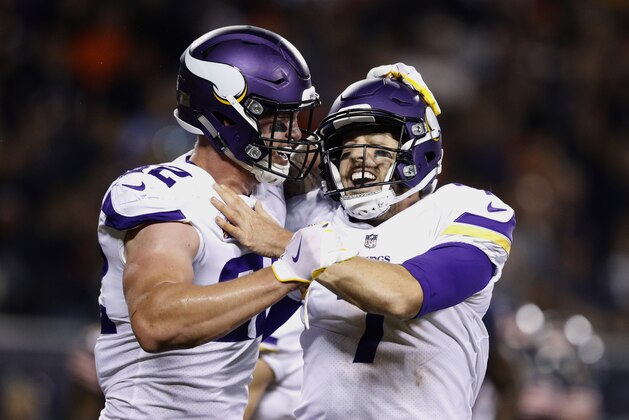 CHICAGO, IL - OCTOBER 09:  Kyle Rudolph #82 and quarterback  Case Keenum #7 of the Minnesota Vikings celebrate after Rudolph scored against the Chicago Bears in the third quarter at Soldier Field on October 9, 2017 in Chicago, Illinois.  (Photo by Joe Robbins/Getty Images)