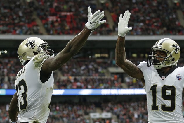 LONDON, ENGLAND - OCTOBER 01: Michael Thomas #13 of the New Orleans Saints celebrates with Ted Ginn Jnr #19 after scoring the first touchdown during the NFL game between the Miami Dolphins and the New Orleans Saints at Wembley Stadium on October 1, 2017 in London, England. (Photo by Henry Browne/Getty Images)