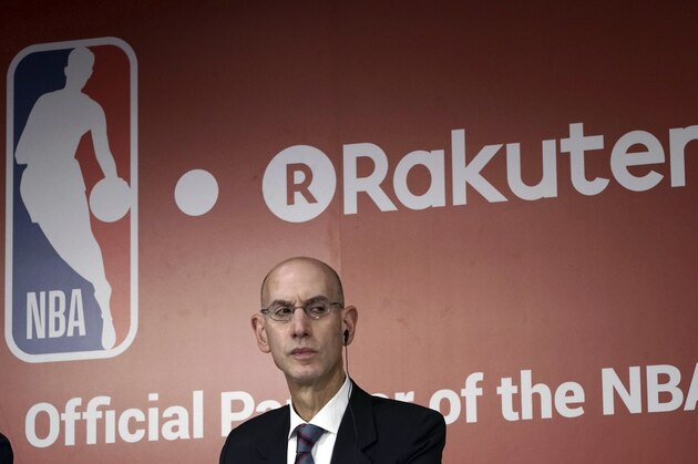 Adam Silver, the commissioner of the National Basketball Association (NBA) listens a question from a journalist during the joint press conference with Rakuten, Inc. in Tokyo Tuesday, Oct. 10, 2017. Japanese online retailer Rakuten will be NBA's exclusive distribution partner in Japan for live NBA games and a global marketing partner of the NBA. (AP Photo/Eugene Hoshiko)