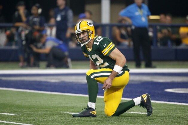 Green Bay Packers quarterback Aaron Rodgers (12) gets up off the field during an NFL football game agains the Dallas Cowboys on Sunday, Oct. 8, 2017, in Arlington, Texas. (AP Photo/Michael Ainsworth) Green Bay Packers quarterback Aaron Rodgers (12) gets up off the field during an NFL football game agains the Dallas Cowboys on Sunday, Oct. 8, 2017, in Arlington, Texas. (AP Photo/Michael Ainsworth)