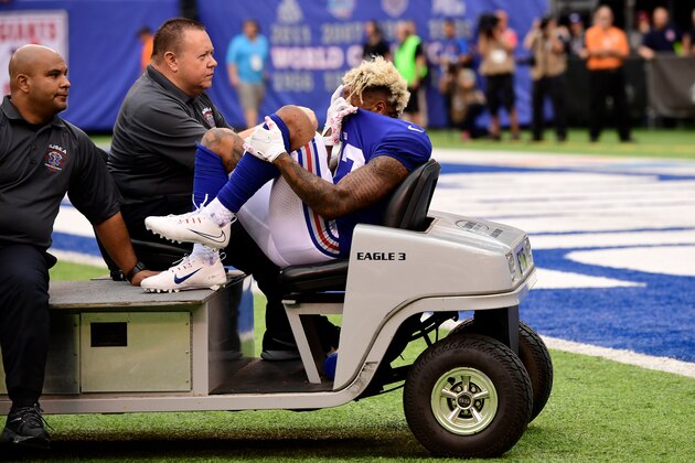 EAST RUTHERFORD, NJ - OCTOBER 08:  Odell Beckham #13 of the New York Giants is carted off the field after sustaining an injury during the fourth quarter against the Los Angeles Chargers during an NFL game at MetLife Stadium on October 8, 2017 in East Rutherford, New Jersey. The Los Angeles Chargers defeated the New York Giants 27-22.  (Photo by Steven Ryan/Getty Images)