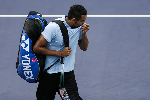 SHANGHAI, CHINA - OCTOBER 10:  Nick Kyrgios of Australia reacts after retiring from the Men's singles mach against  Steve Johnson of United States on day 3 of Shanghai Rolex Masters at Qi Zhong Tennis Centre on October 10, 2017 in Shanghai, China.  (Photo by Yifan Ding/Getty Images)