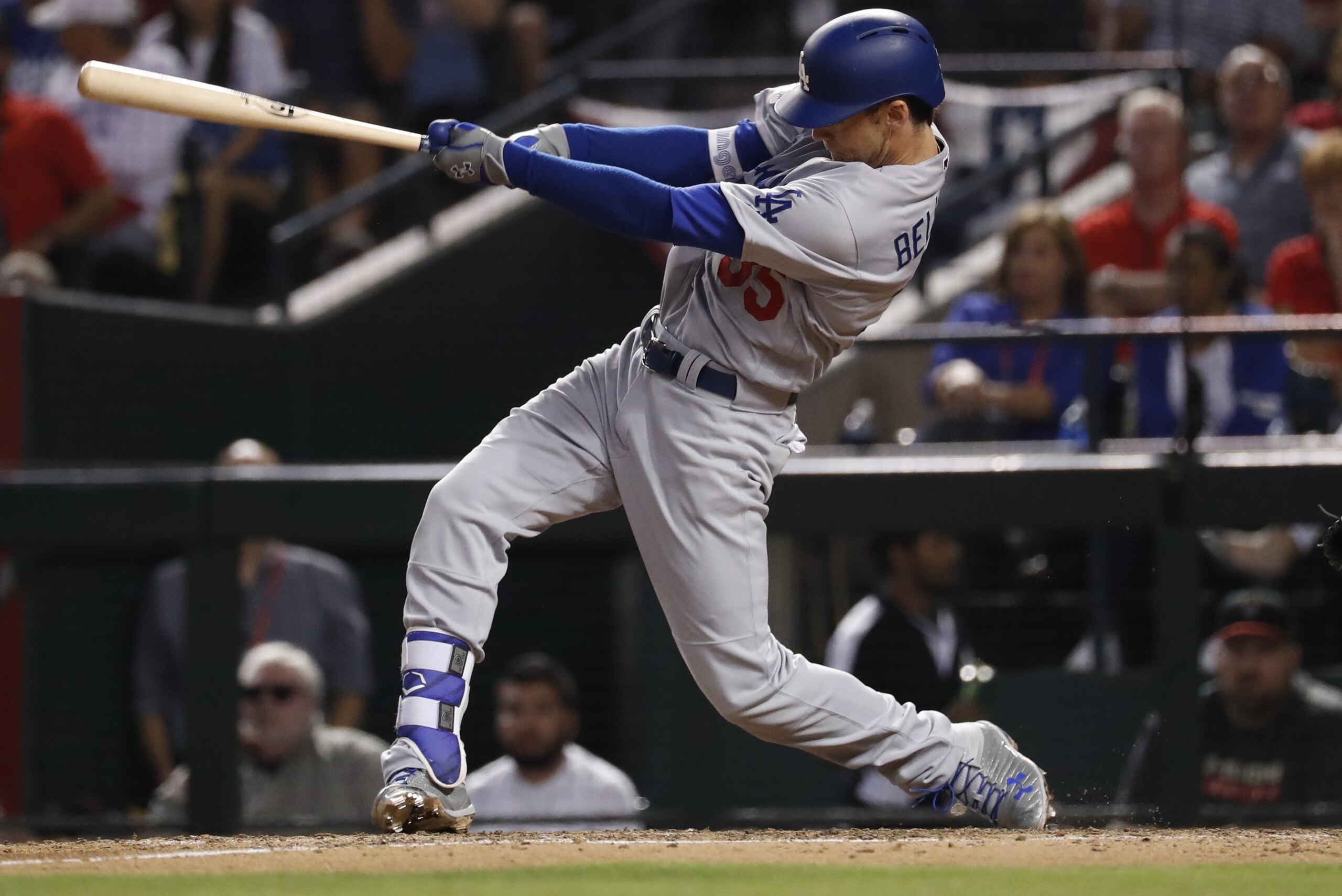 Los Angeles Dodgers' Cody Bellinger connects for a solo home run during the fifth inning of game 3 of baseball's National League Division Series against the Arizona Diamondbacks, Monday, Oct. 9, 2017, in Phoenix. (AP Photo/Rick Scuteri)