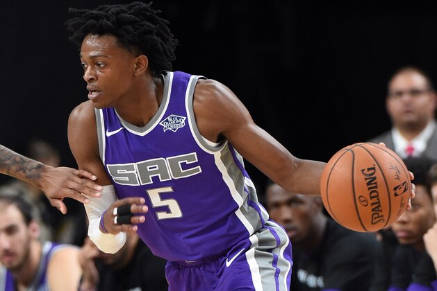 LAS VEGAS, NV - OCTOBER 08:  De'Aaron Fox #5 of the Sacramento Kings handles the ball against the Los Angeles Lakers during their preseason game at T-Mobile Arena on October 8, 2017 in Las Vegas, Nevada. Los Angeles won 75-69. NOTE TO USER: User expressly acknowledges and agrees that, by downloading and or using this photograph, User is consenting to the terms and conditions of the Getty Images License Agreement.  (Photo by Ethan Miller/Getty Images)