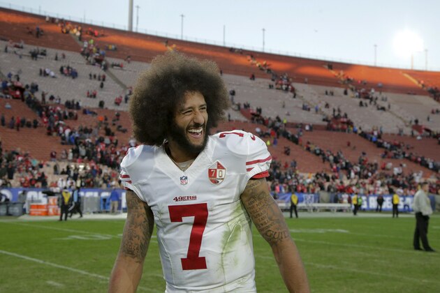 San Francisco 49ers quarterback Colin Kaepernick smiles after the 49ers' 22-21 win over the Los Angeles Rams during an NFL football game Saturday, Dec. 24, 2016, in Los Angeles. (AP Photo/Jae C. Hong)