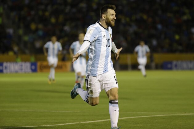 Argentina's Lionel Messi celebrates after scoring his third goal against Ecuador during their 2018 World Cup qualifying soccer match at the Atahualpa Olympic Stadium in Quito, Ecuador, Tuesday, Oct. 10, 2017. (AP Photo/Fernando Vergara)