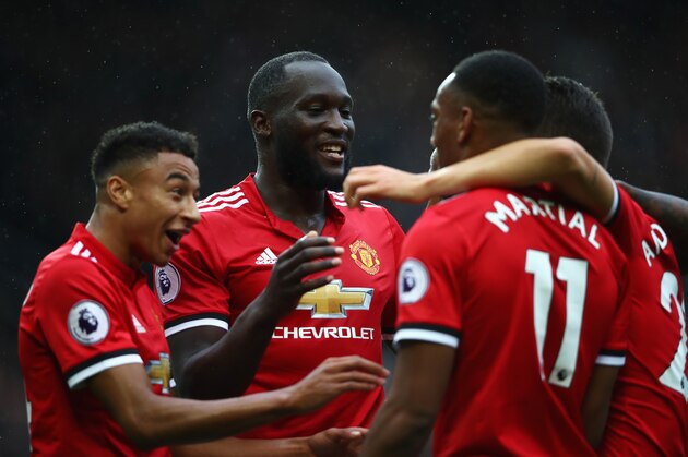 MANCHESTER, ENGLAND - SEPTEMBER 30:  Romelu Lukaku of Manchester United celebrates scoring his side's fourth goal with his team mates during the Premier League match between Manchester United and Crystal Palace at Old Trafford on September 30, 2017 in Manchester, England.  (Photo by Clive Brunskill/Getty Images)