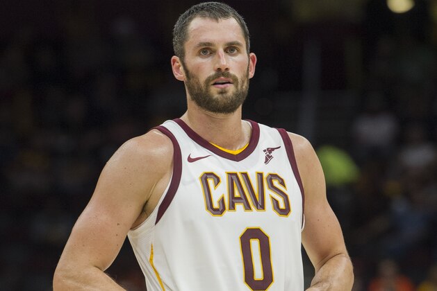 Cleveland Cavaliers' Kevin Love (0) pauses against the Atlanta Hawks during an NBA pre-season basketball game in Cleveland, Wednesday, Oct. 4, 2017. (AP Photo/Phil Long)