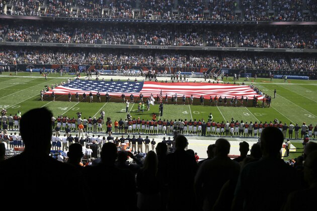 The Pittsburgh Steelers side of the field is nearly empty during the playing of the national anthem before an NFL football game between the Steelers and Chicago Bears, Sunday, Sept. 24, 2017, in Chicago. The Pittsburgh Steelers players did not come out to the field during the anthem. (AP Photo/Kiichiro Sato)