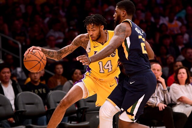 LOS ANGELES, CA - OCTOBER 10:  Brandon Ingram #14 of the Los Angeles Lakers attempts to dribble past Royce O'Neale #23 of the Utah Jazz during the first half at Staples Center on October 10, 2017 in Los Angeles, California.  (Photo by Harry How/Getty Images)
