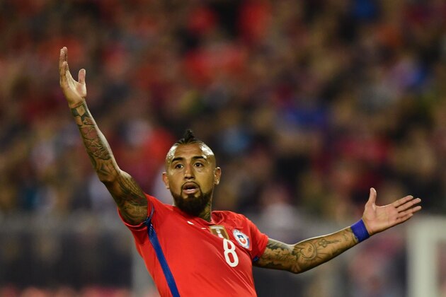 Chile's Arturo Vidal gestures during the 2018 World Cup qualifier football match against Paraguay, in Santiago, on August 31, 2017. / AFP PHOTO / Martin BERNETTI        (Photo credit should read MARTIN BERNETTI/AFP/Getty Images)