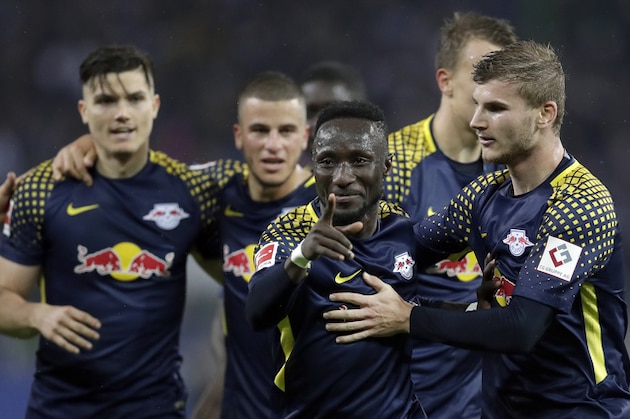Leipzig's scorer Naby Keita, 2nd right, and his teammates celebrate the opening goal during the German Bundesliga soccer match between Hamburger SV and RB Leipzig in Hamburg, Germany, Friday, Sept. 8, 2017. (AP Photo/Michael Sohn)