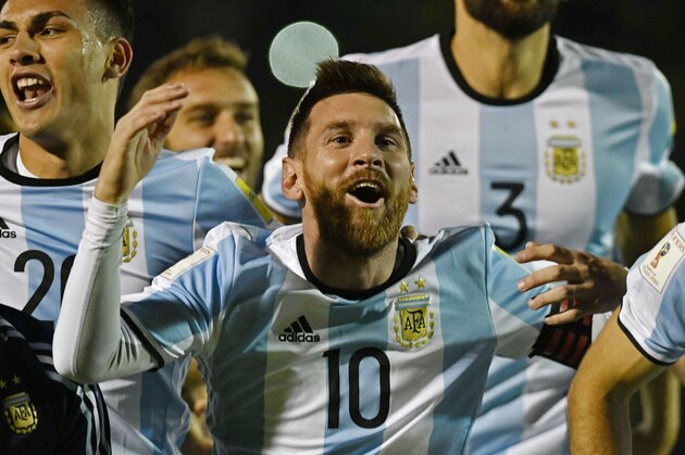 Argentina's Lionel Messi (C) celebrates after defeating Ecuador and qualifying to the 2018 World Cup football tournament, in Quito, on October 10, 2017. / AFP PHOTO / Juan Ruiz (Photo credit should read JUAN RUIZ/AFP/Getty Images) Argentina's Lionel Messi (C) celebrates after defeating Ecuador and qualifying to the 2018 World Cup football tournament, in Quito, on October 10, 2017. / AFP PHOTO / Juan Ruiz (Photo credit should read JUAN RUIZ/AFP/Getty Images)