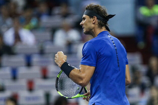 SHANGHAI, CHINA - OCTOBER 12:  Rafael Nadal of Spain reacts after winning a point during the Men's singles mach against Fabio Fognini of Italy on day 5 of 2017 ATP Shanghai Rolex Masters at Qizhong Stadium on October 12, 2017 in Shanghai, China.  (Photo by Yifan Ding/Getty Images)
