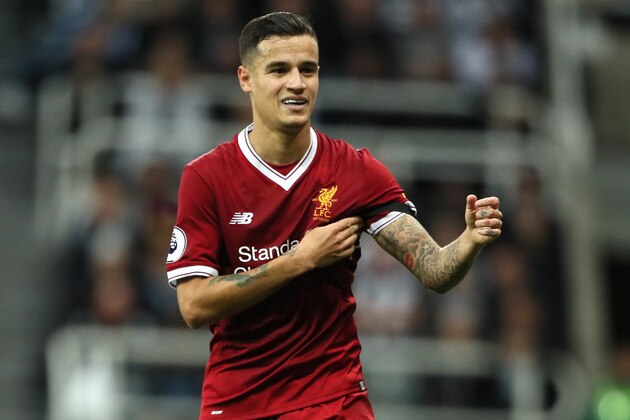 NEWCASTLE UPON TYNE, ENGLAND - OCTOBER 01:  Philippe Coutinho of Liverpool reacts during the Premier League match between Newcastle United and Liverpool at St. James' Park on October 1, 2017 in Newcastle upon Tyne, England.  (Photo by Matthew Ashton - AMA/Getty Images)