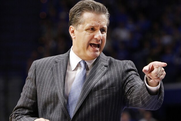 Kentucky head coach John Calipari points to his bench during the second half of an NCAA college basketball game against LSU, Tuesday, Feb. 7, 2017, in Lexington, Ky. Kentucky won 92-85.(AP Photo/James Crisp)