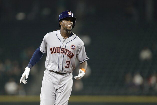 Houston Astros' Cameron Maybin rounds the bases after hitting a two-run home run against the Seattle Mariners during a baseball game Wednesday, Sept. 6, 2017, in Seattle. (AP Photo/John Froschauer)