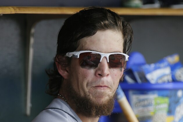 Tampa Bay Rays' Colby Rasmus sits in the dugout during a baseball game against the Detroit Tigers Saturday, June 17, 2017, in Detroit. (AP Photo/Duane Burleson)