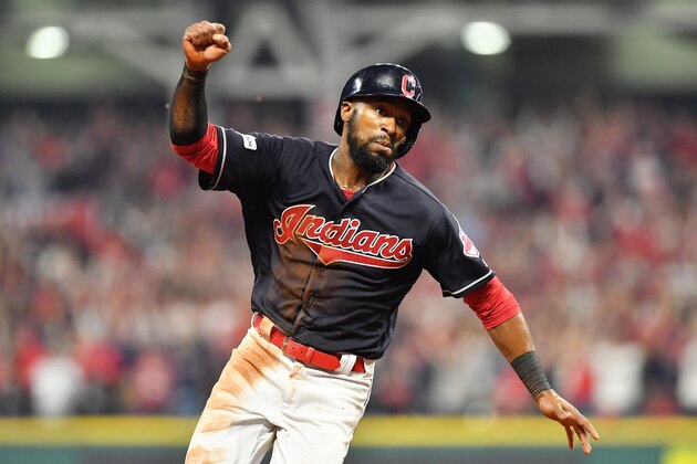 CLEVELAND, OH - OCTOBER 06:  Austin Jackson #26 runs home to score the winning run on a single by Yan Gomes #7 of the Cleveland Indians to win the game 9 to 8 in the 13th inning during game two of the American League Division Series at Progressive Field on October 6, 2017 in Cleveland, Ohio.  (Photo by Jason Miller/Getty Images)