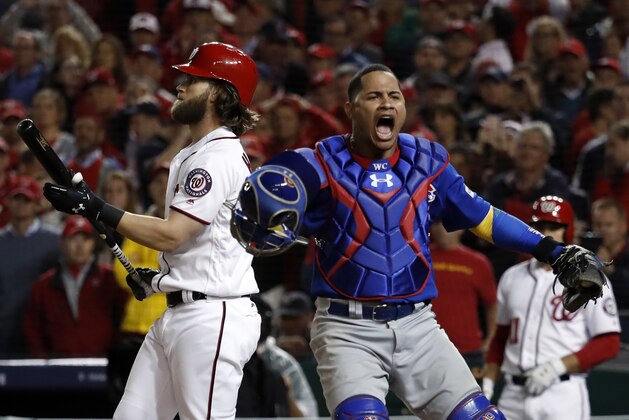 Chicago Cubs catcher Willson Contreras (40) reacts after Washington Nationals' Bryce Harper struck out for the final out as the Cubs beat the Washington Nationals 9-8 to to win baseball's National League Division Series, at Nationals Park, early Friday, Oct. 13, 2017, in Washington. (AP Photo/Pablo Martinez Monsivais) Chicago Cubs catcher Willson Contreras (40) reacts after Washington Nationals' Bryce Harper struck out for the final out as the Cubs beat the Washington Nationals 9-8 to to win baseball's National League Division Series, at Nationals Park, early Friday, Oct. 13, 2017, in Washington. (AP Photo/Pablo Martinez Monsivais)