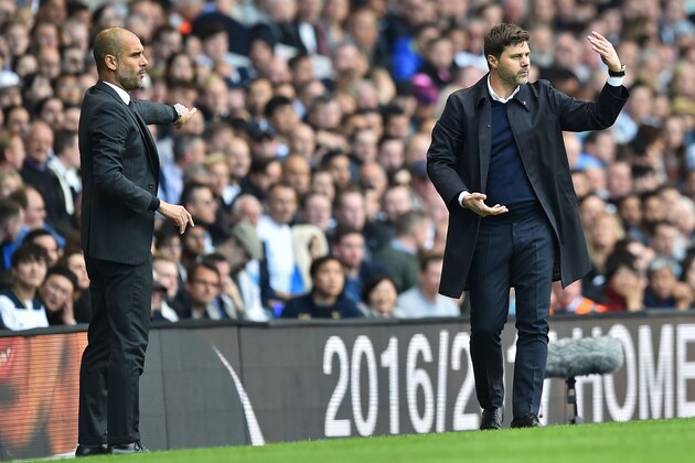 Manchester City's Spanish manager Pep Guardiola (L) and Tottenham Hotspur's Argentinian head coach Mauricio Pochettino gesture on the touchline during the English Premier League football match between Tottenham Hotspur and Manchester City at White Hart Lane in London, on October 2, 2016. / AFP / Glyn KIRK / RESTRICTED TO EDITORIAL USE. No use with unauthorized audio, video, data, fixture lists, club/league logos or 'live' services. Online in-match use limited to 75 images, no video emulation. No use in betting, games or single club/league/player publications.  /         (Photo credit should read GLYN KIRK/AFP/Getty Images)