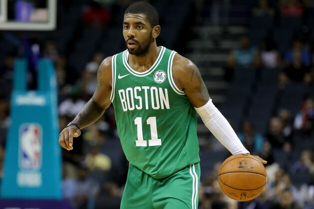 CHARLOTTE, NC - OCTOBER 11:  Kyrie Irving #11 of the Boston Celtics against the Charlotte Hornets during their game at Spectrum Center on October 11, 2017 in Charlotte, North Carolina. NOTE TO USER: User expressly acknowledges and agrees that, by downloading and or using this photograph, User is consenting to the terms and conditions of the Getty Images License Agreement.  (Photo by Streeter Lecka/Getty Images)