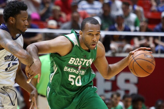 SALT LAKE CITY, UT - JULY 6: Trevor Thompson #50 of the Boston Celtics handles the ball against the Utah Jazz during the 2017 Utah Summer League on July 6, 2017 at Jon M. Huntsman Center in Salt Lake City, Utah. NOTE TO USER: User expressly acknowledges and agrees that, by downloading and or using this Photograph, User is consenting to the terms and conditions of the Getty Images License Agreement. Mandatory Copyright Notice: Copyright 2017 NBAE (Photo by Melissa Majchrzak/NBAE via Getty Images)